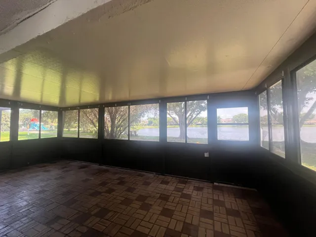 an empty room with windows