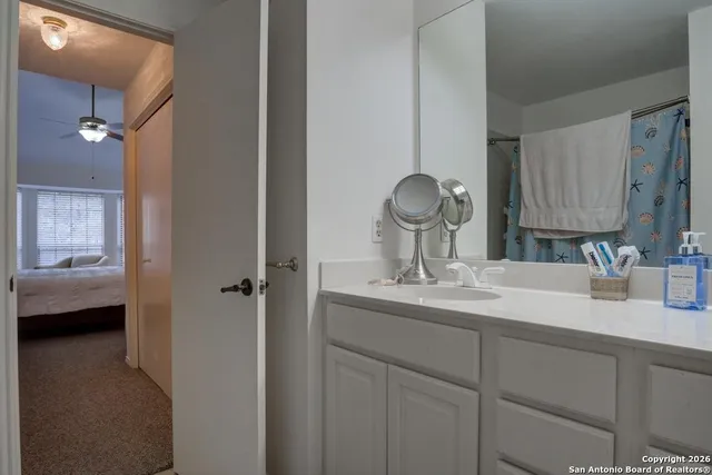 a bedroom with a bed furniture and a window