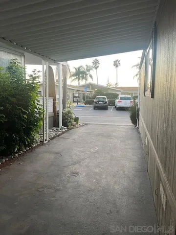 a view of a porch and garden