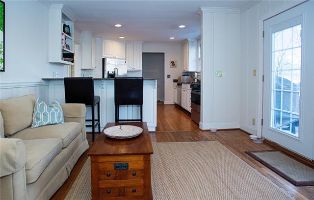 106 Alton Road Nashville, TN 37205 - Photo 8 of 15 Den opens to kitchen and has access through new French doors to deck