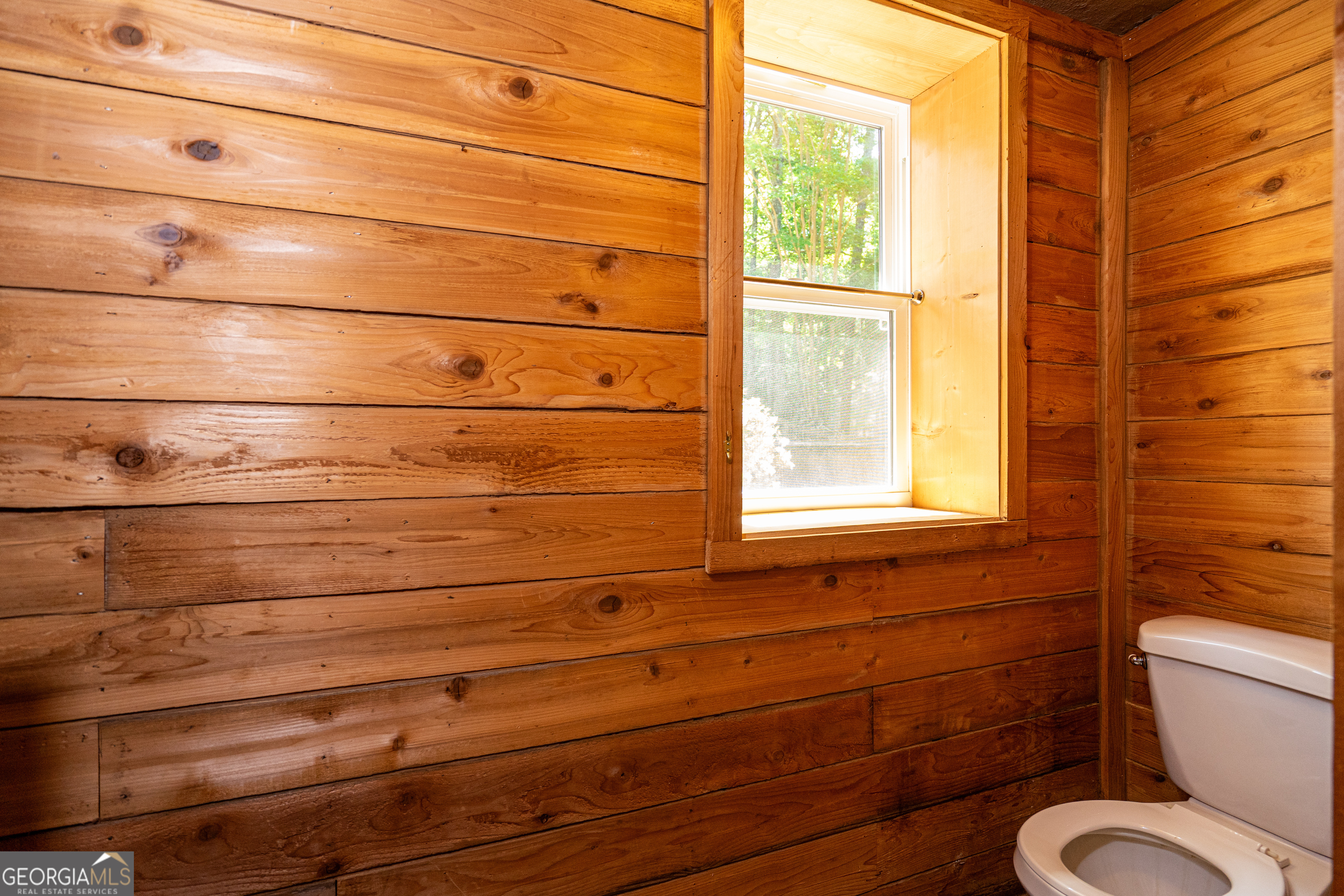 230 Kelly Drive Hamilton, GA 31811 - Photo 22 of 53 a bathroom with a toilet and a window