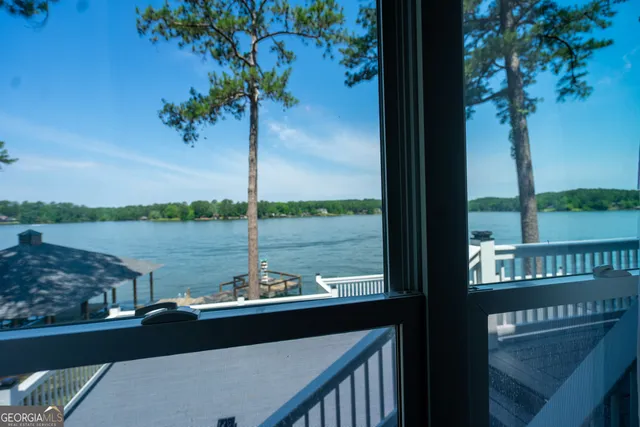 a view of a lake from a balcony