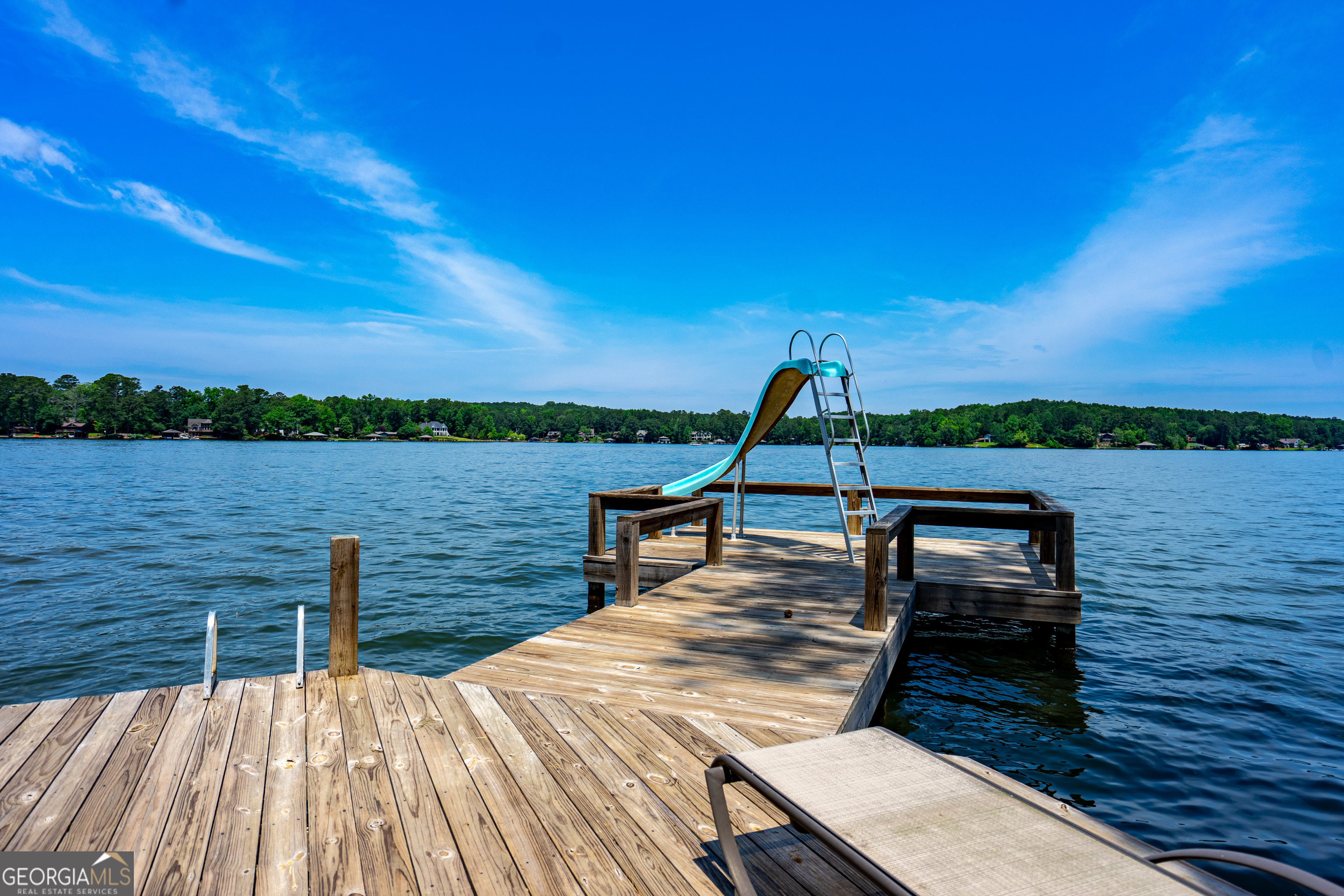 230 Kelly Drive Hamilton, GA 31811 - Photo 42 of 53 a view of a lake with outdoor seating