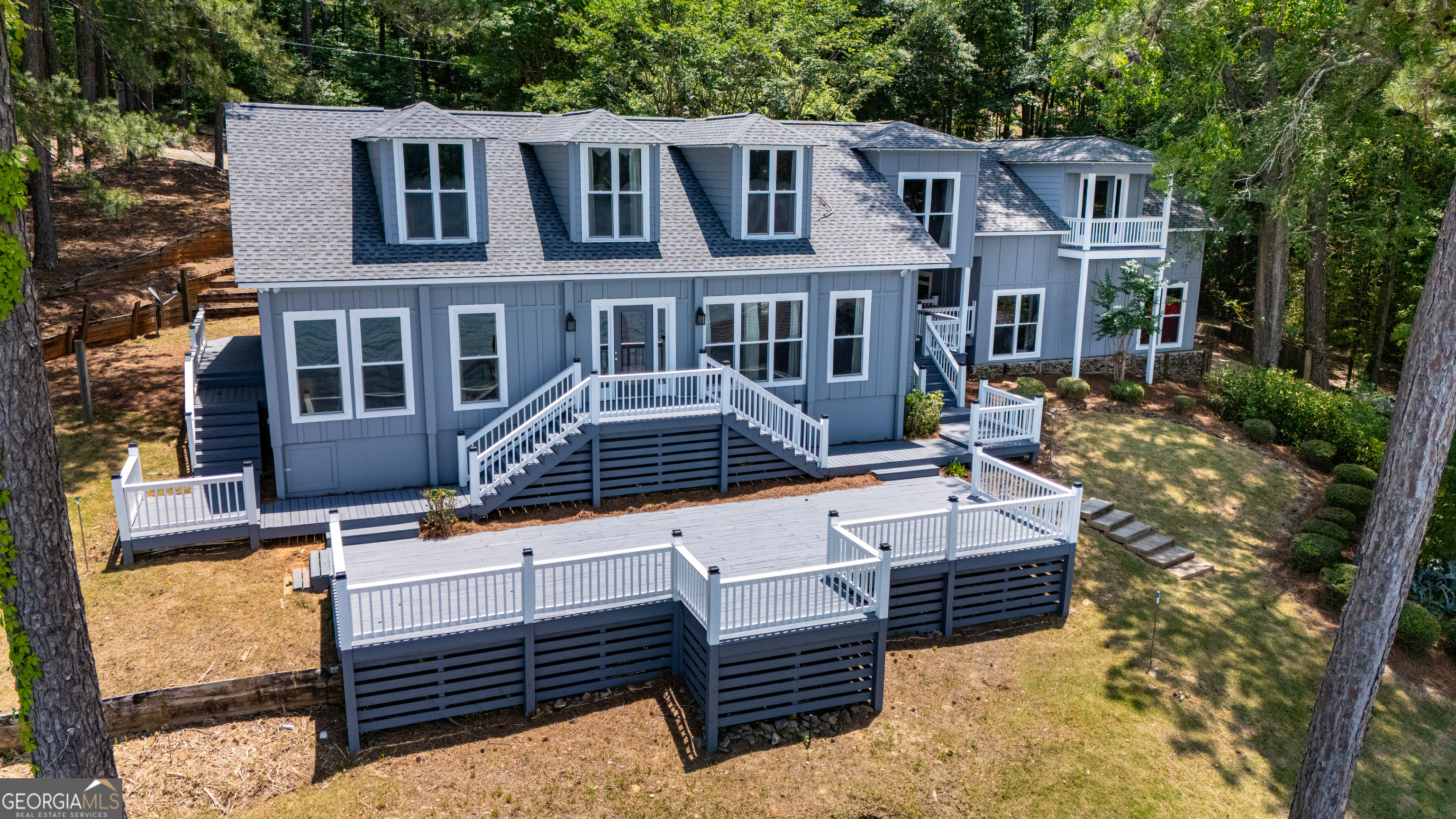 230 Kelly Drive Hamilton, GA 31811 - Photo 53 of 53 a view of a patio with couches chairs and wooden floor
