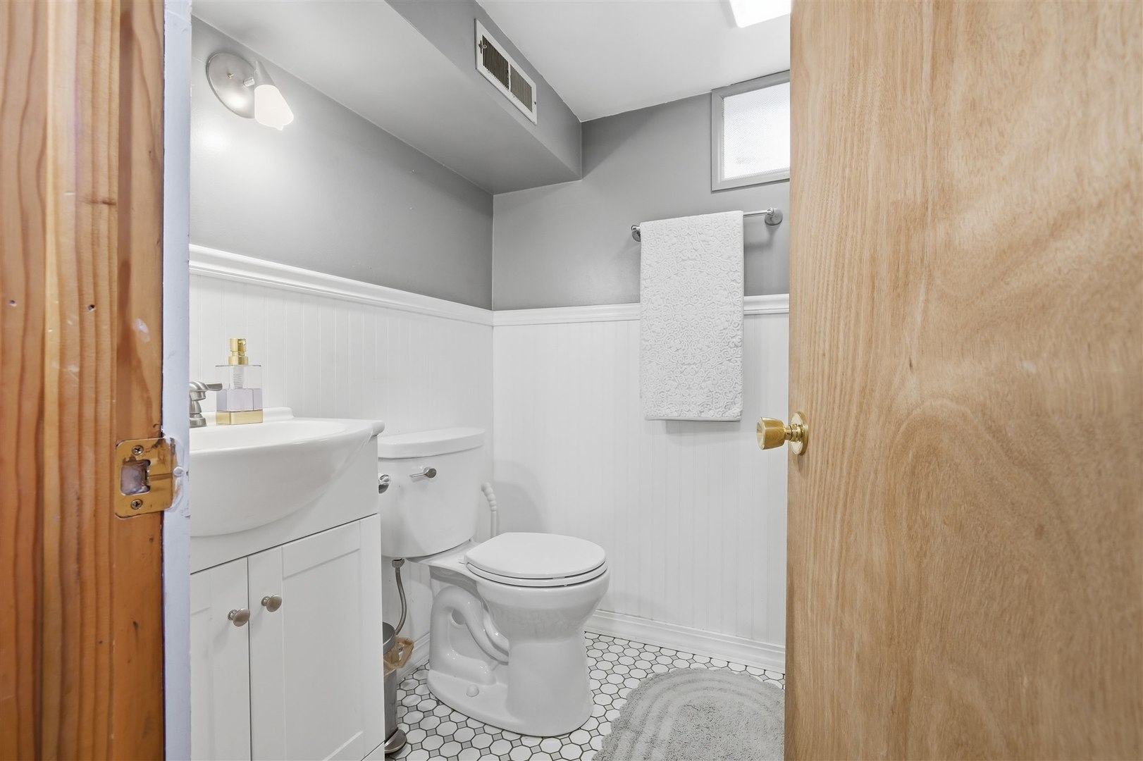 600 Normal Avenue Normal, IL 61761 - Photo 22 of 29 a bathroom with a sink toilet and shower