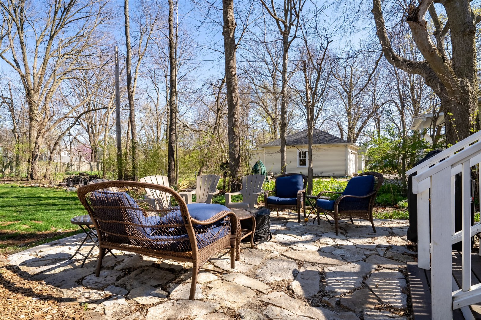 600 Normal Avenue Normal, IL 61761 - Photo 25 of 29 a view of a patio with a table chairs and a fire pit