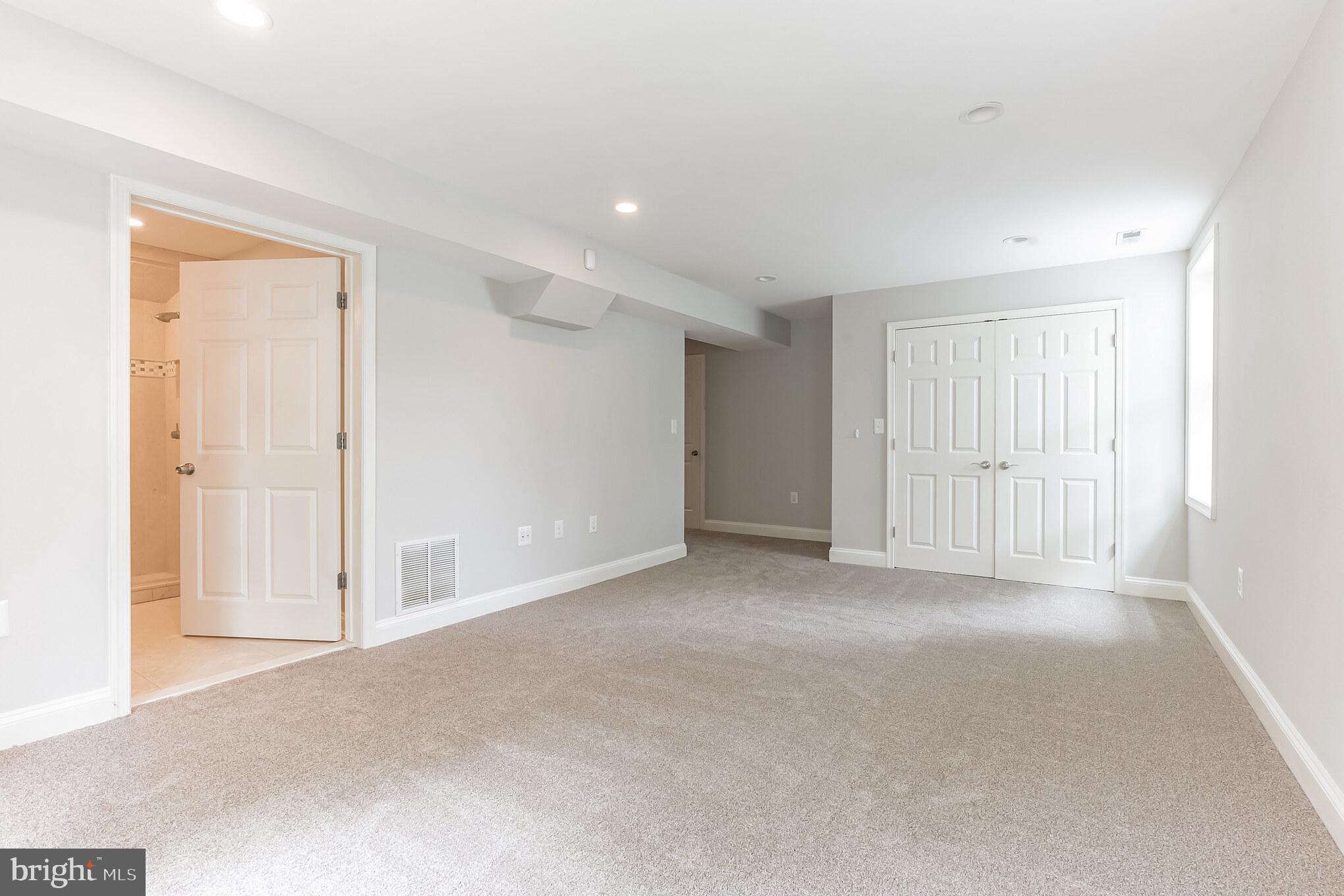 1925 Rudolph Lane Lusby, MD 20657 - Photo 41 of 58 Fully Finished Basement: Living Room 1