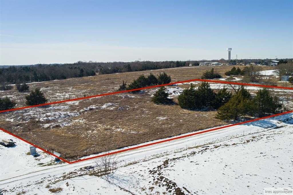 982 Willy Vester Road Van Alstyne, TX 75495 - Photo 27 of 28 a view of a lake with a yard