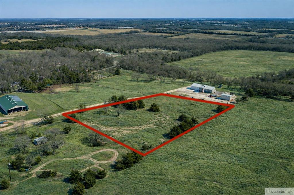 982 Willy Vester Road Van Alstyne, TX 75495 - Photo 5 of 28 an aerial view of a golf course with chairs