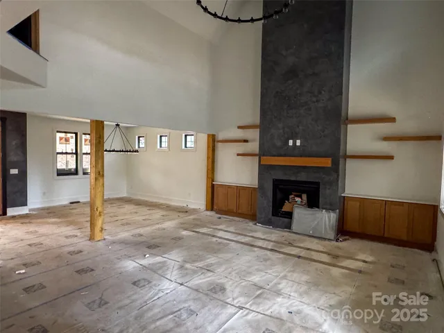 a view of a livingroom with a fireplace