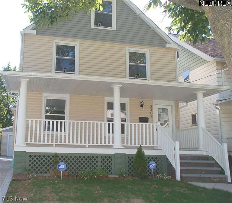 3307 Altoona Road, Unit 1 Cleveland, OH 44109 - Photo 1 of 7 Exterior completely re built with vinyl siding , newer energy rated windows, and newer concrete drive way.