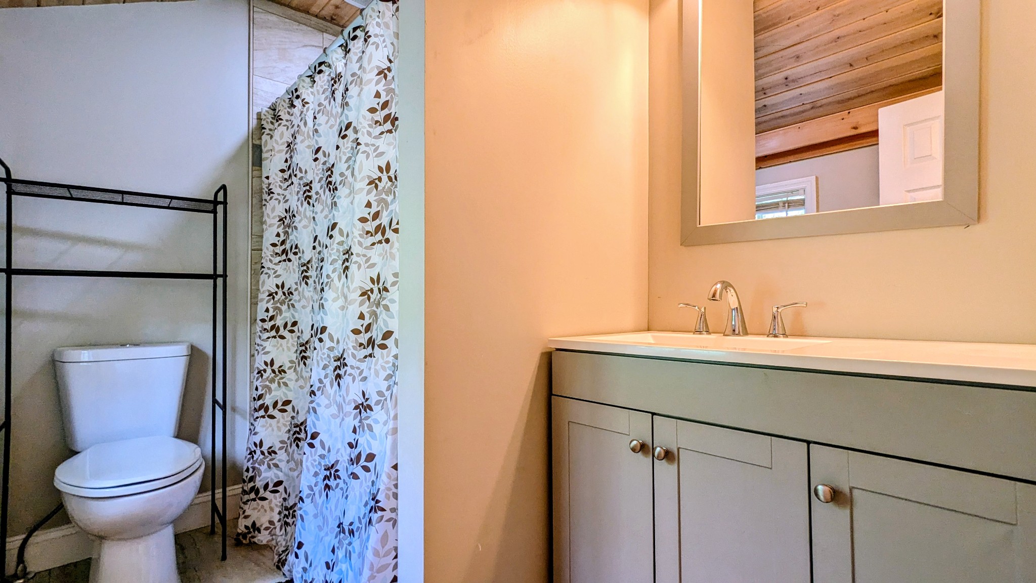 335 Turkey Creek Road Carthage, TN 37030 - Photo 17 of 36 a bathroom with a sink toilet and shower