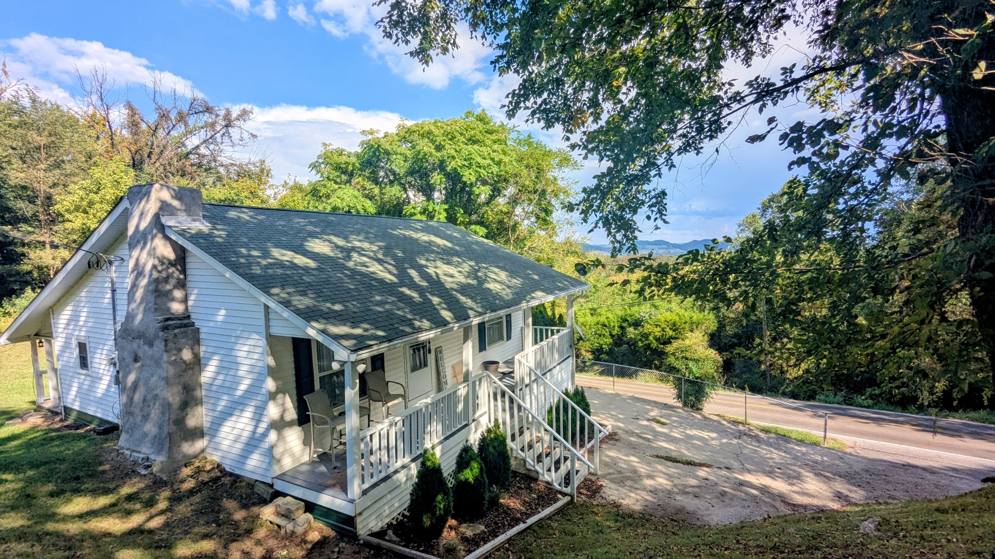 335 Turkey Creek Road Carthage, TN 37030 - Photo 2 of 36 a view of a house with a tree in the yard