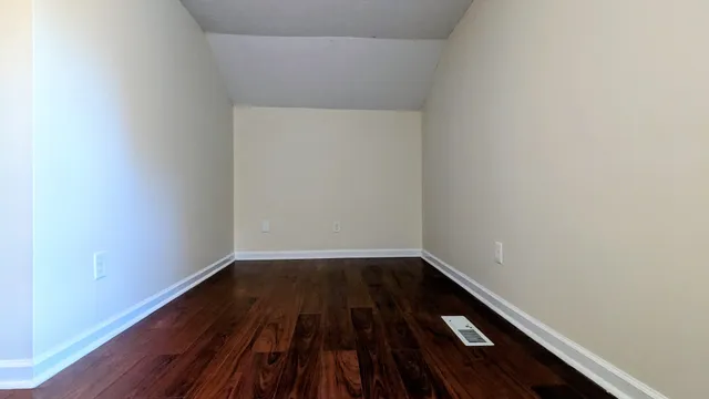 a view of small space with wooden floor