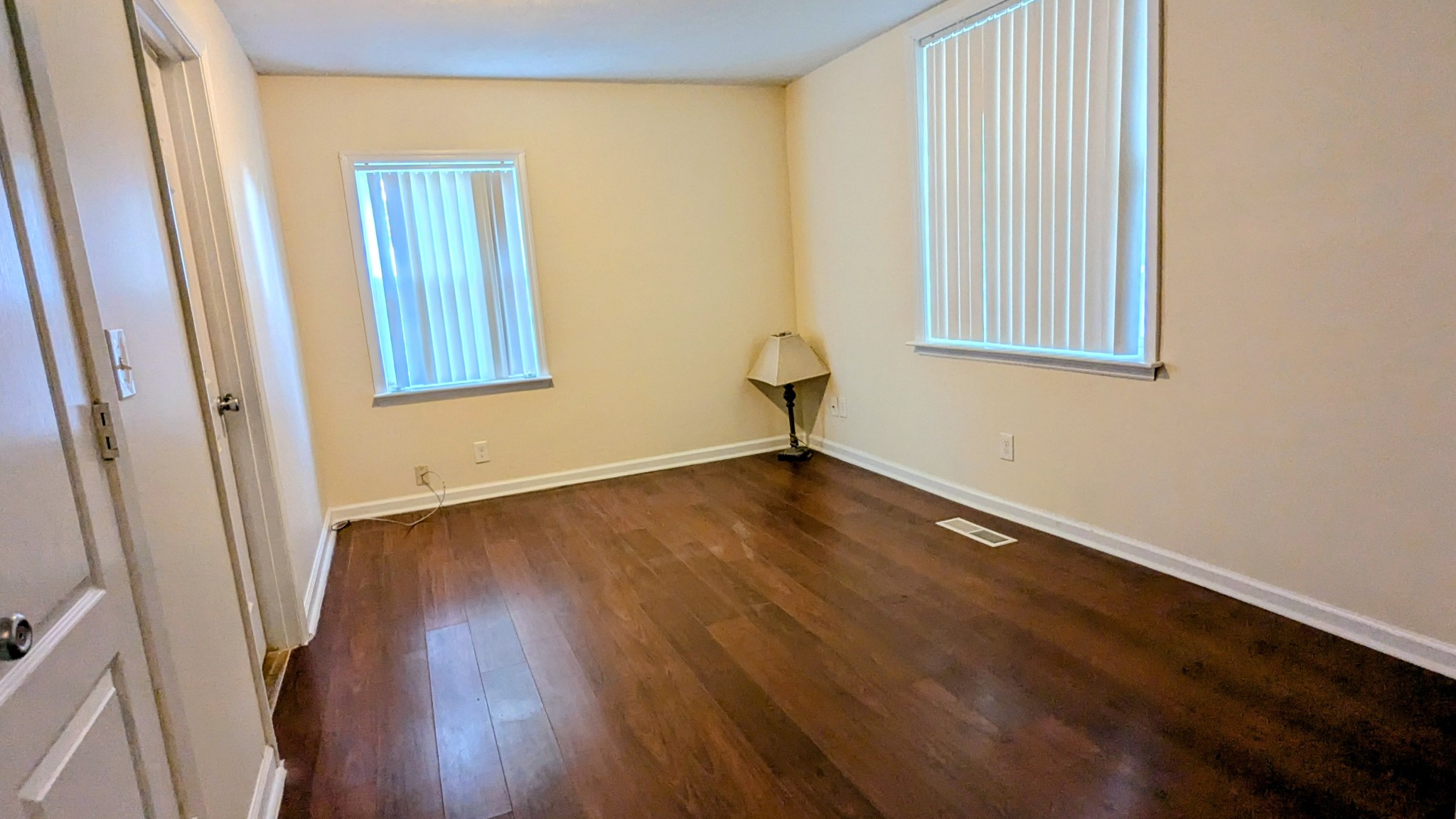 335 Turkey Creek Road Carthage, TN 37030 - Photo 23 of 36 an empty room with wooden floor and windows