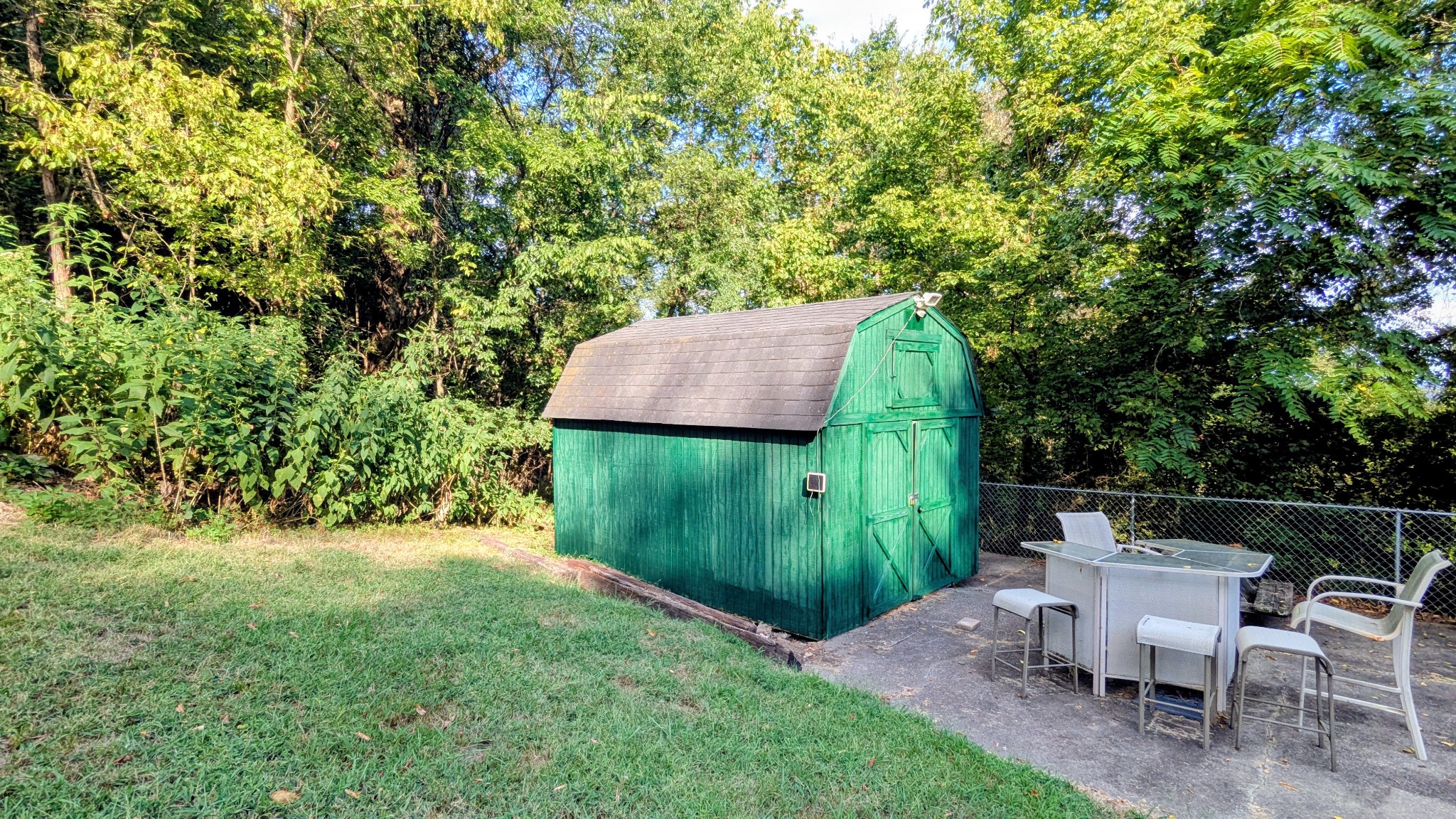 335 Turkey Creek Road Carthage, TN 37030 - Photo 31 of 36 a view of a chairs and table in backyard