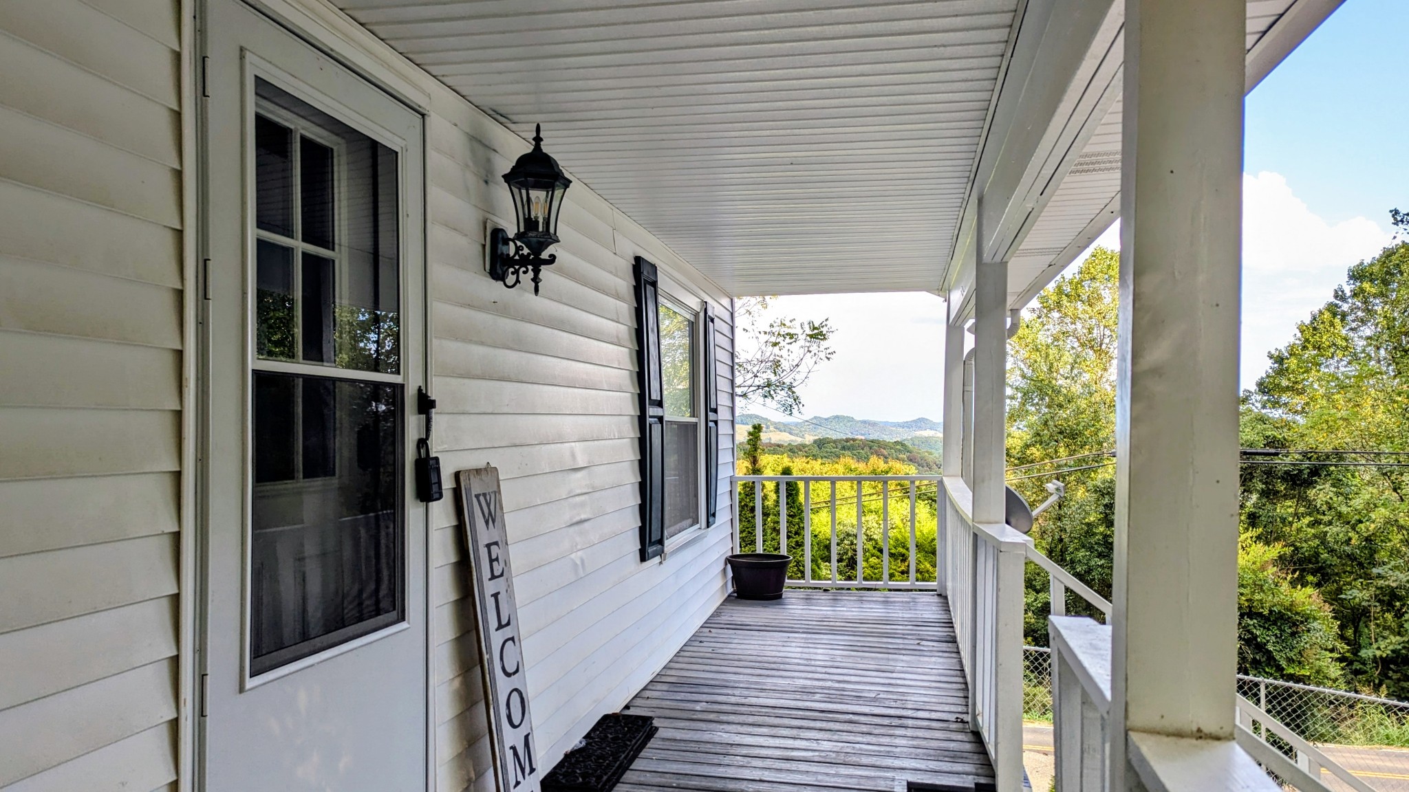 335 Turkey Creek Road Carthage, TN 37030 - Photo 6 of 36 a view of balcony and wooden floor