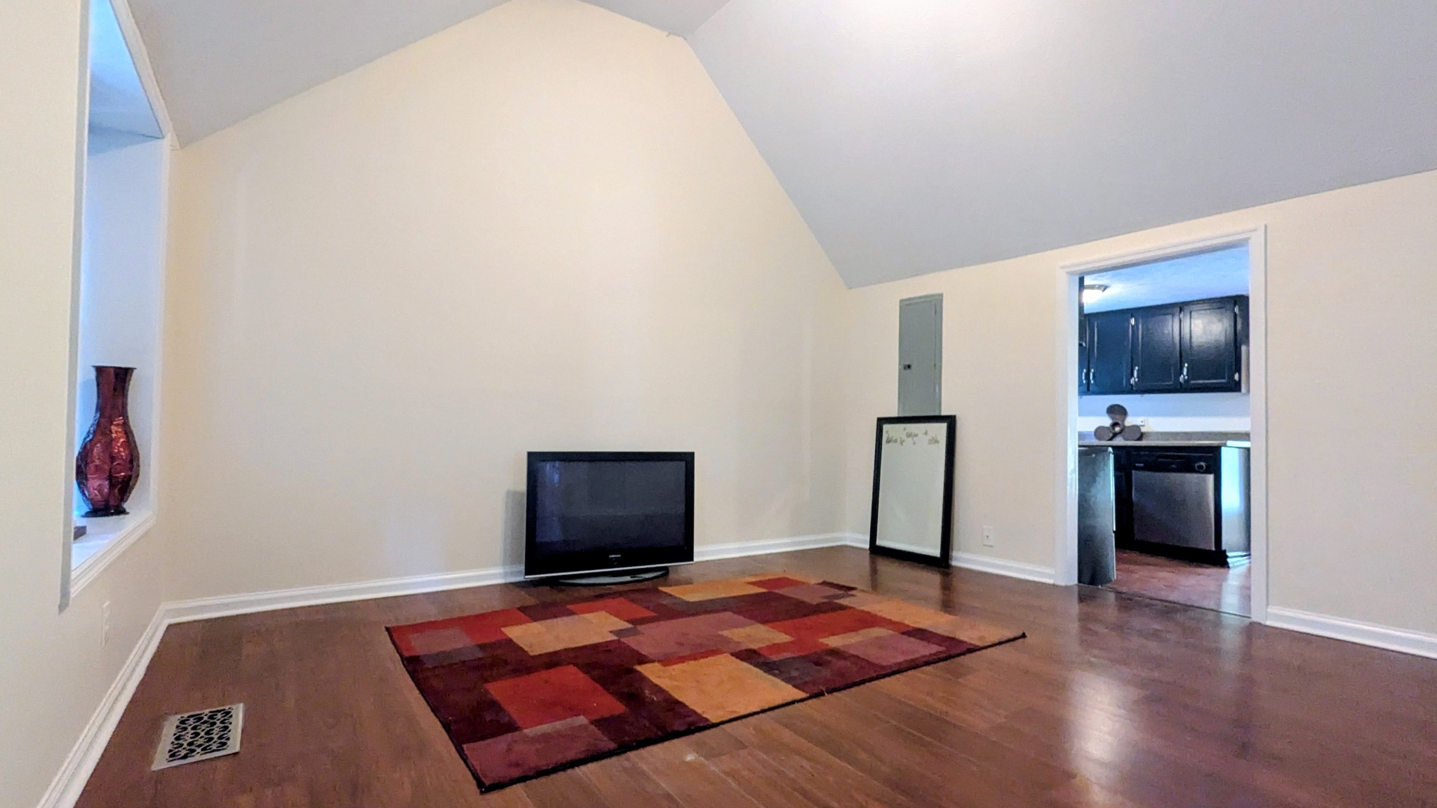 335 Turkey Creek Road Carthage, TN 37030 - Photo 10 of 36 a living room with hard wood floor and a flat screen tv
