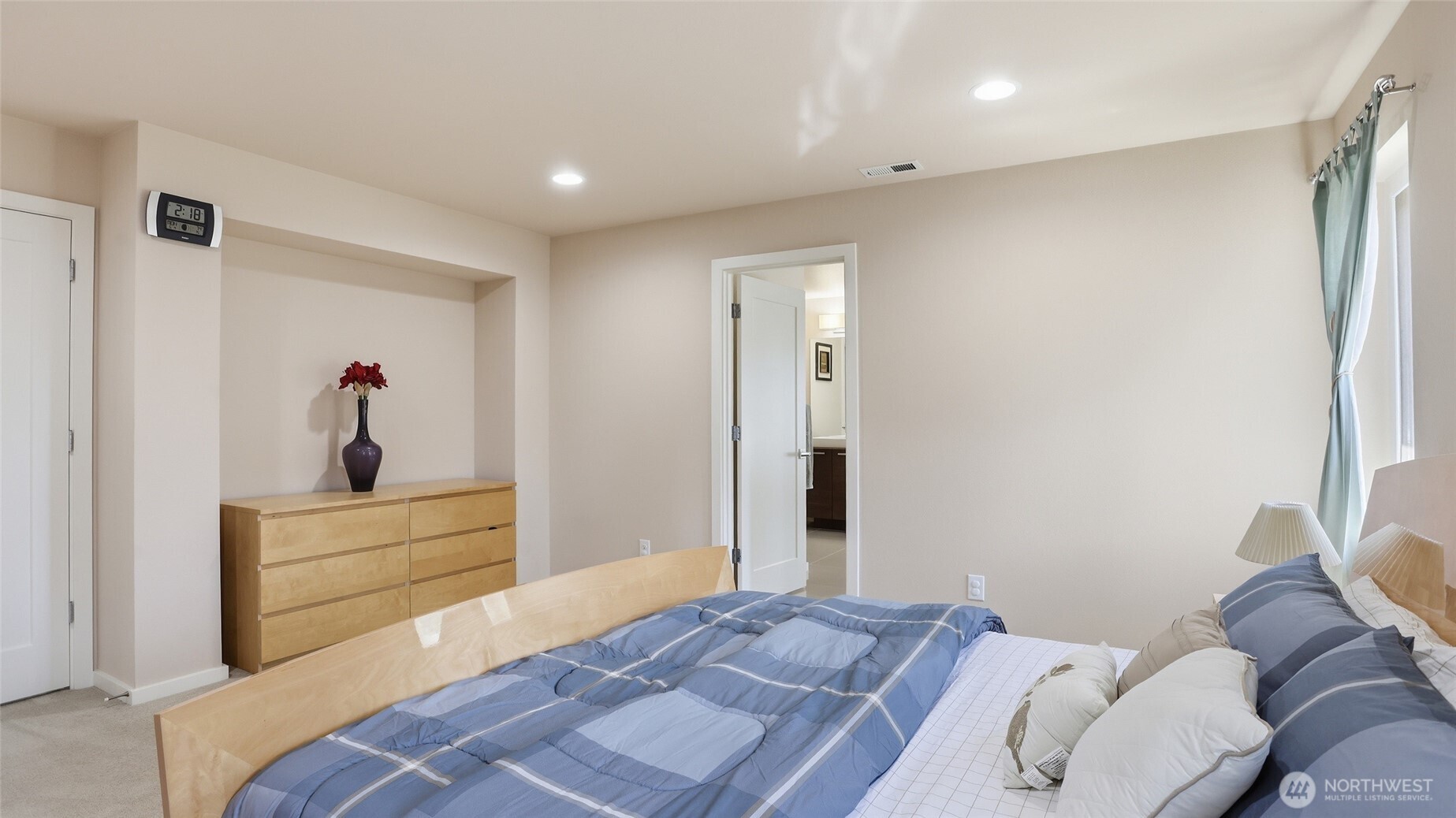 3709 Northeast 24th Street Renton, WA 98056 - Photo 19 of 37 a bedroom with a bed and wooden floor