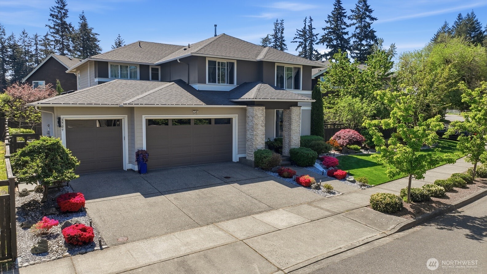 3709 Northeast 24th Street Renton, WA 98056 - Photo 2 of 37 a front view of a house