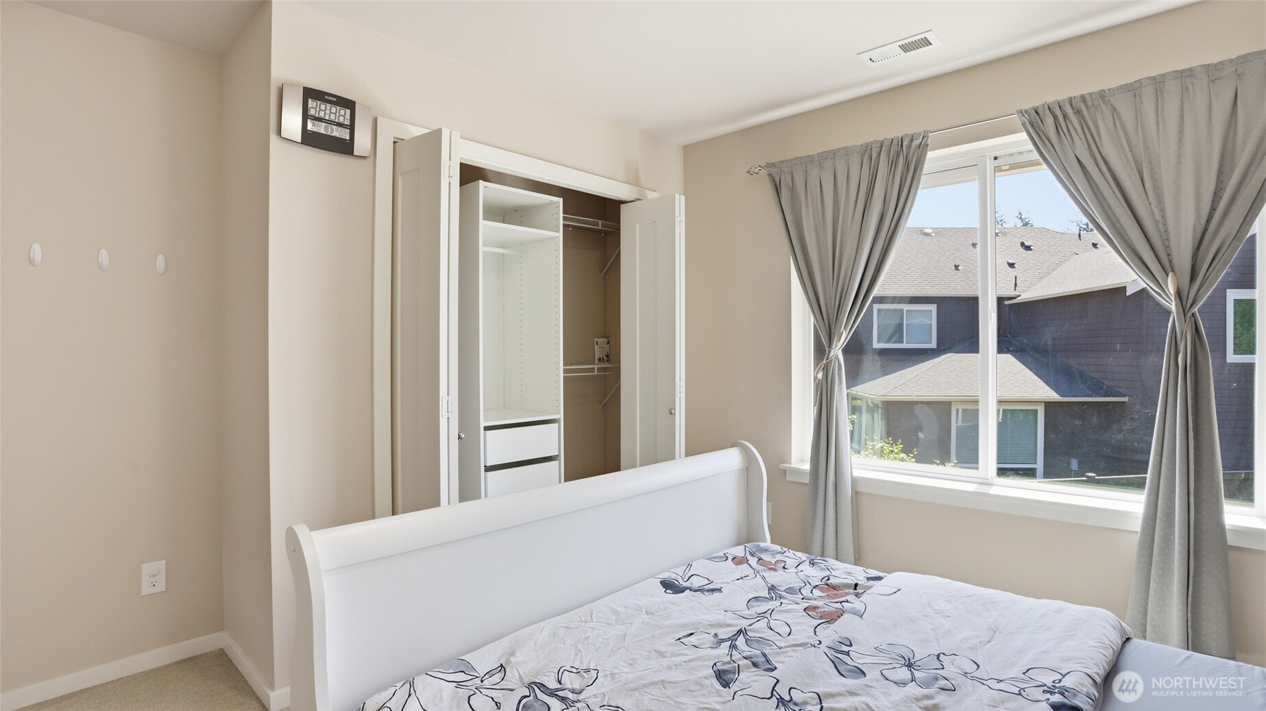 3709 Northeast 24th Street Renton, WA 98056 - Photo 26 of 37 a bedroom with a bed and a window with outer view