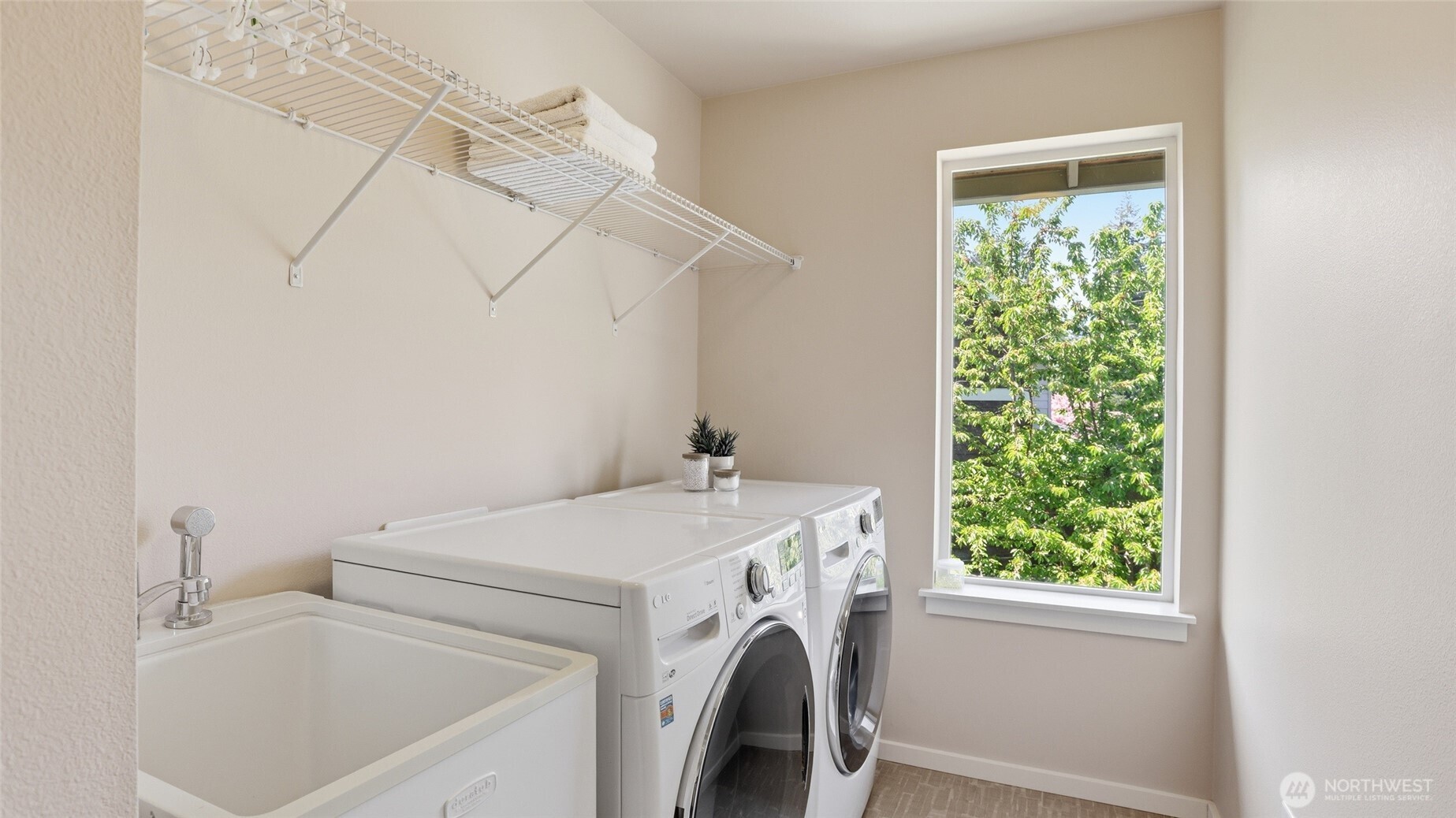 3709 Northeast 24th Street Renton, WA 98056 - Photo 27 of 37 a utility room with dryer and washer