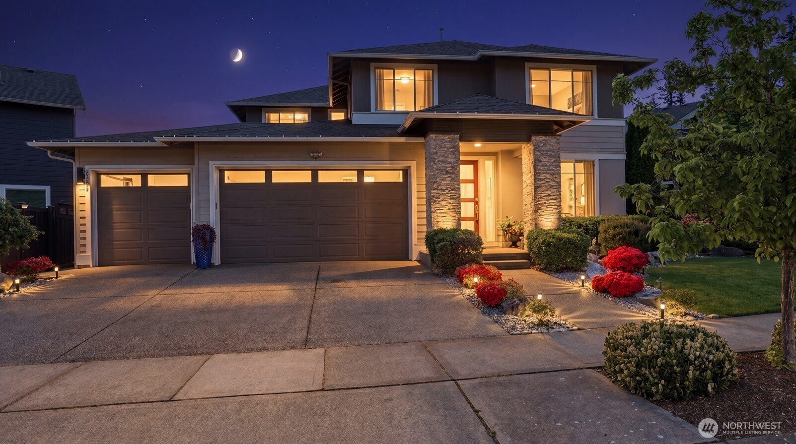 3709 Northeast 24th Street Renton, WA 98056 - Photo 29 of 37 a view of a house with sitting area and potted plants