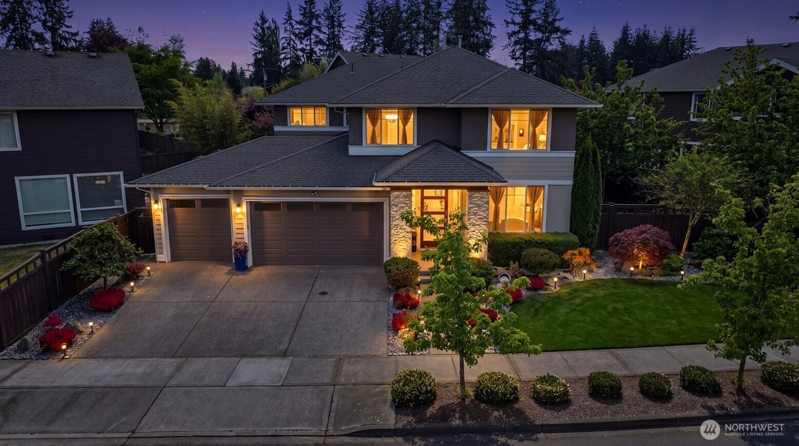 3709 Northeast 24th Street Renton, WA 98056 - Photo 30 of 37 a front view of a house with a yard