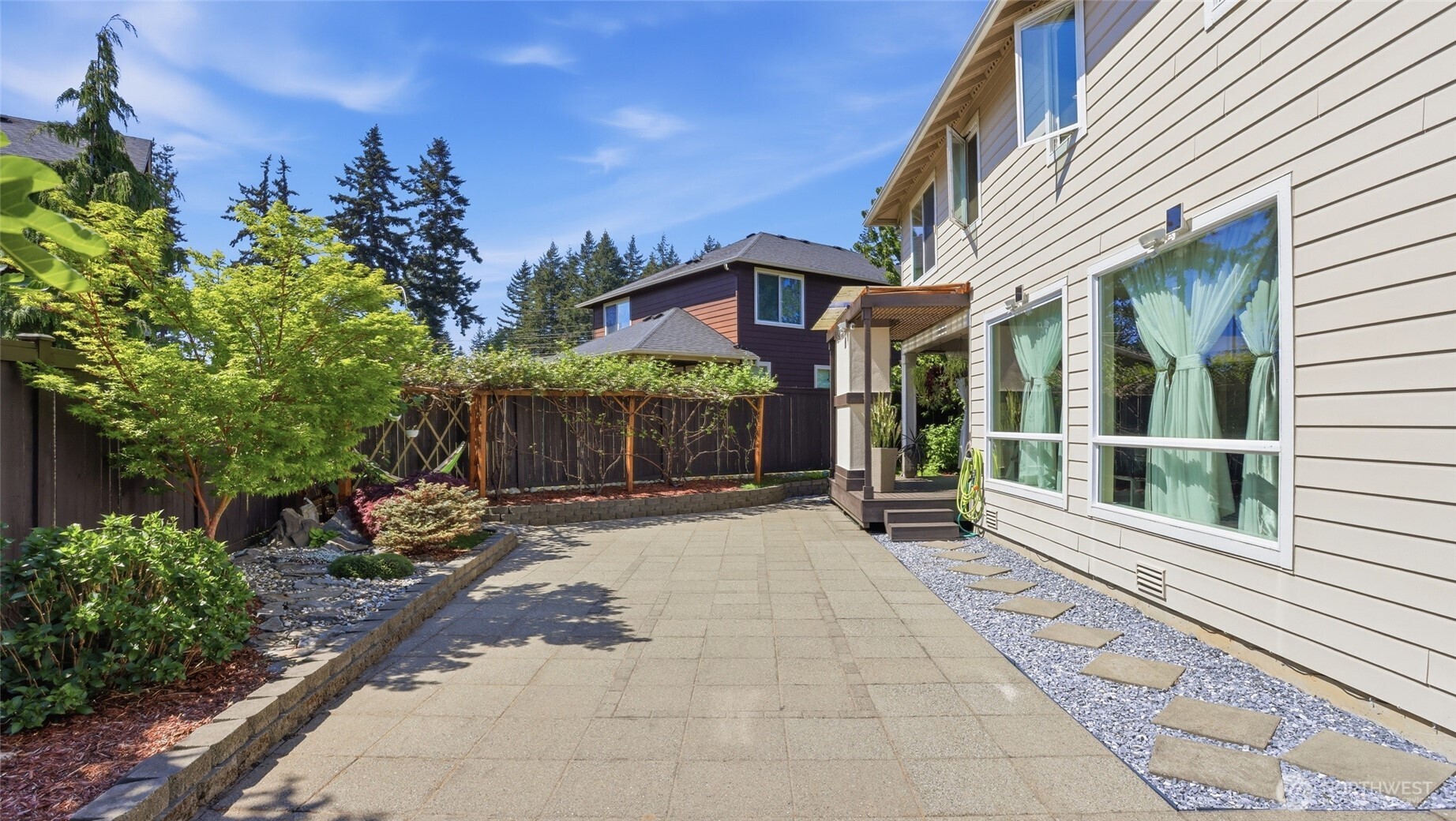 3709 Northeast 24th Street Renton, WA 98056 - Photo 32 of 37 a view of a house with backyard and sitting area