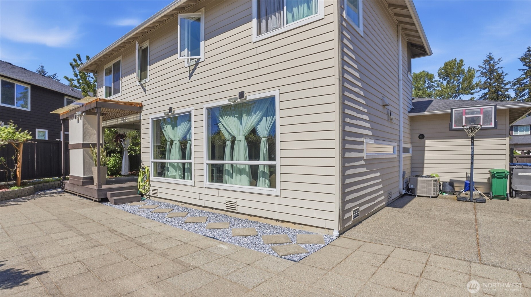 3709 Northeast 24th Street Renton, WA 98056 - Photo 33 of 37 a view of a house with a patio
