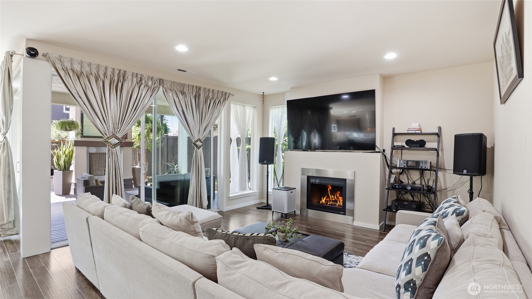 3709 Northeast 24th Street Renton, WA 98056 - Photo 6 of 37 a living room with furniture fireplace and flat screen tv