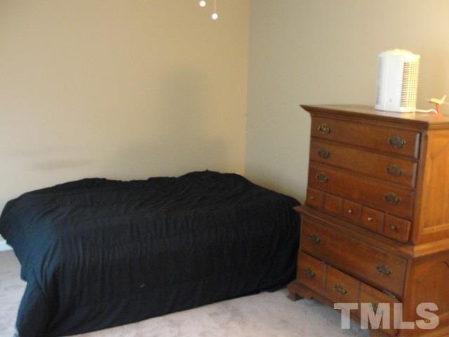 7286 Shellburne Drive, Unit J1 Raleigh, NC 27612 - Photo 11 of 11 a view of dresser and window