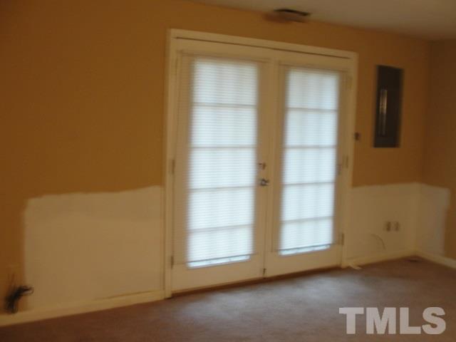 7286 Shellburne Drive, Unit J1 Raleigh, NC 27612 - Photo 5 of 11 an empty room with a window