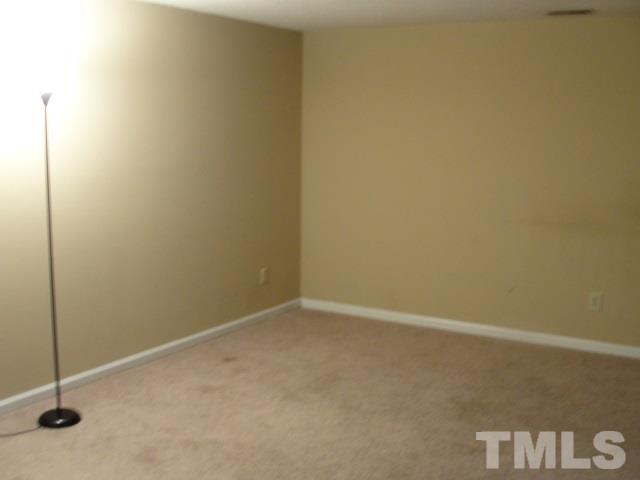 7286 Shellburne Drive, Unit J1 Raleigh, NC 27612 - Photo 6 of 11 a view of an empty room