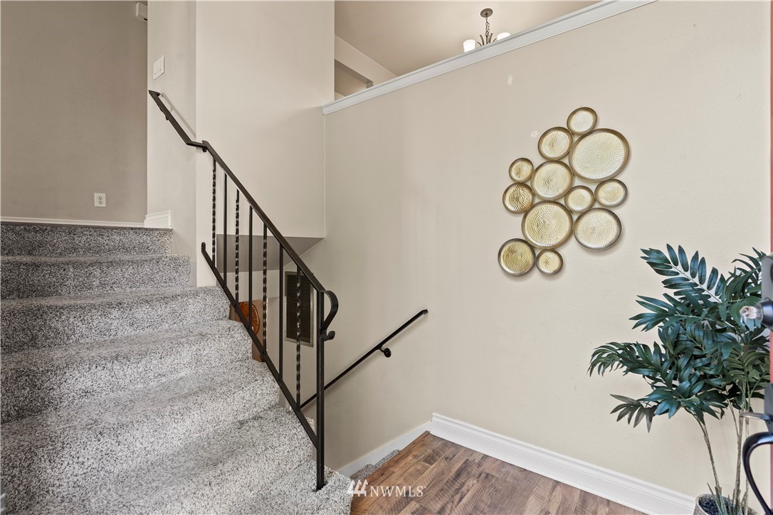 4321 234th Place Southeast Bothell, WA 98021 - Photo 2 of 25 a view of entryway with wooden floor