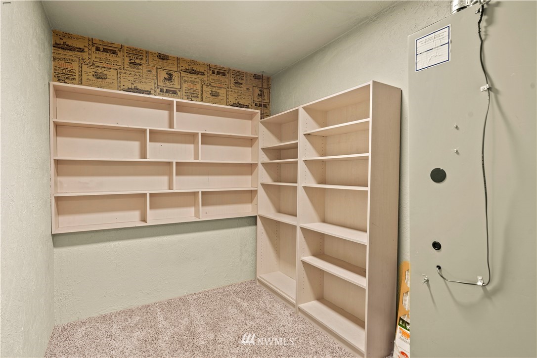 4321 234th Place Southeast Bothell, WA 98021 - Photo 18 of 25 a view of an empty walk in closet