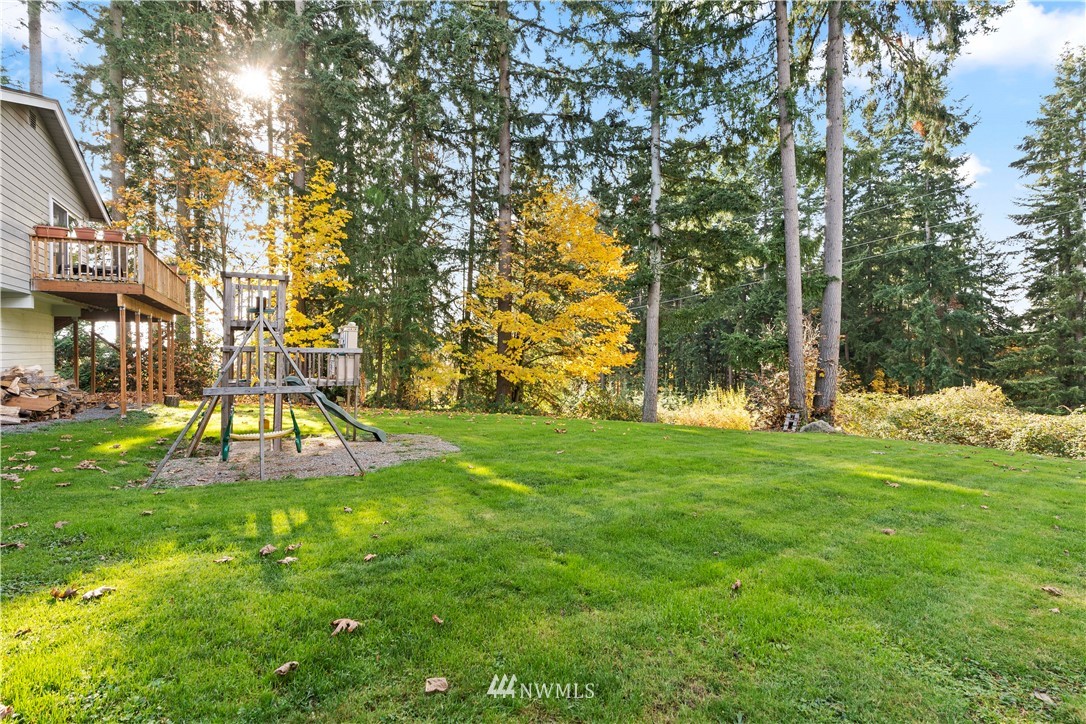 4321 234th Place Southeast Bothell, WA 98021 - Photo 21 of 25 a view of a park with large trees