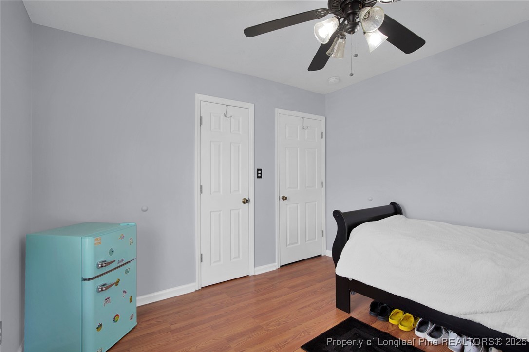 152 Singletary Road Lumberton, NC 28358 - Photo 15 of 33 a bedroom with a bed and a dresser