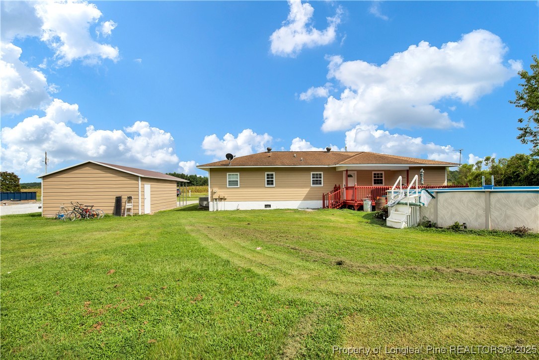 152 Singletary Road Lumberton, NC 28358 - Photo 30 of 33 a view of a house with a big yard and potted plants