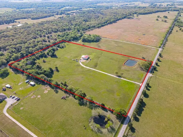 a view of a pool a lake from a window