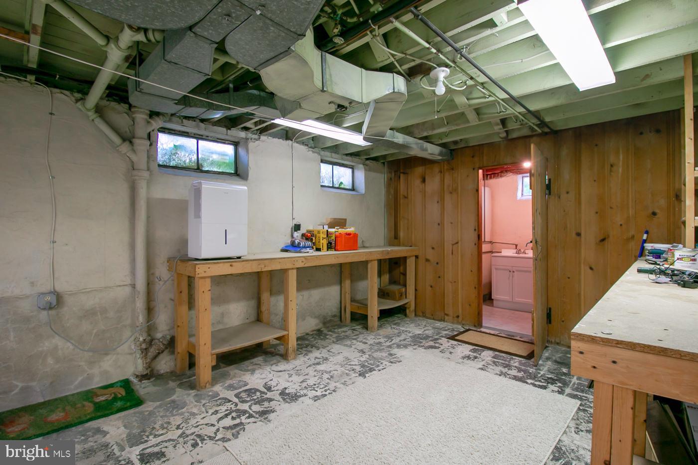 103 Greenbrier Road Towson, MD 21286 - Photo 40 of 53 Right side of basement with workshop
