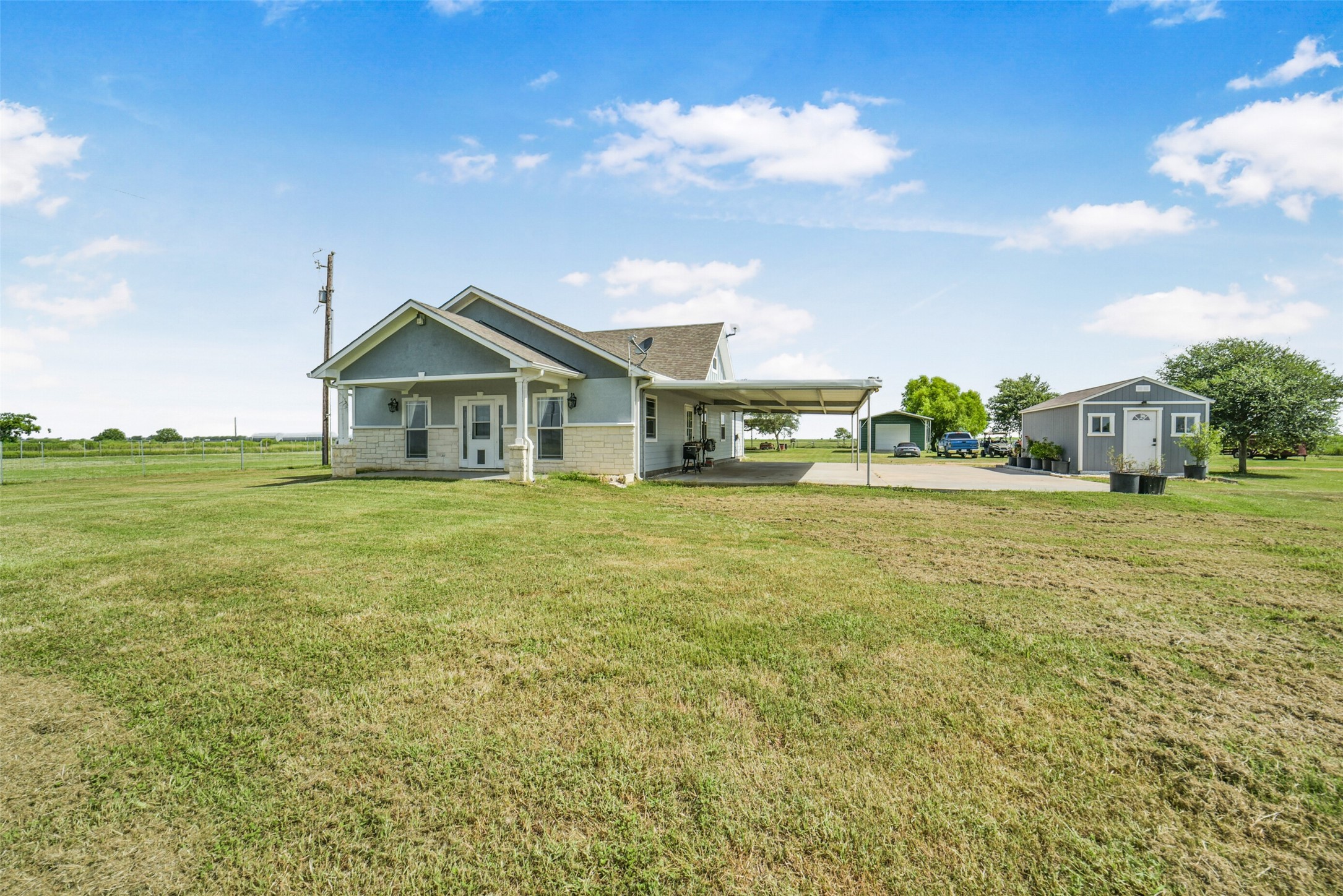 11301 South FM 441 Road El Campo, TX 77437 - Photo 6 of 43 The entire plot has a full irrigation system in place, with 2 water wells for all pastures and the home and guest house.