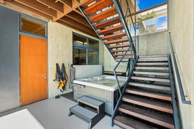 a view of an empty room and an ocean