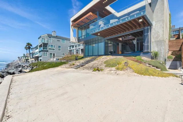 a view of a balcony with an ocean view
