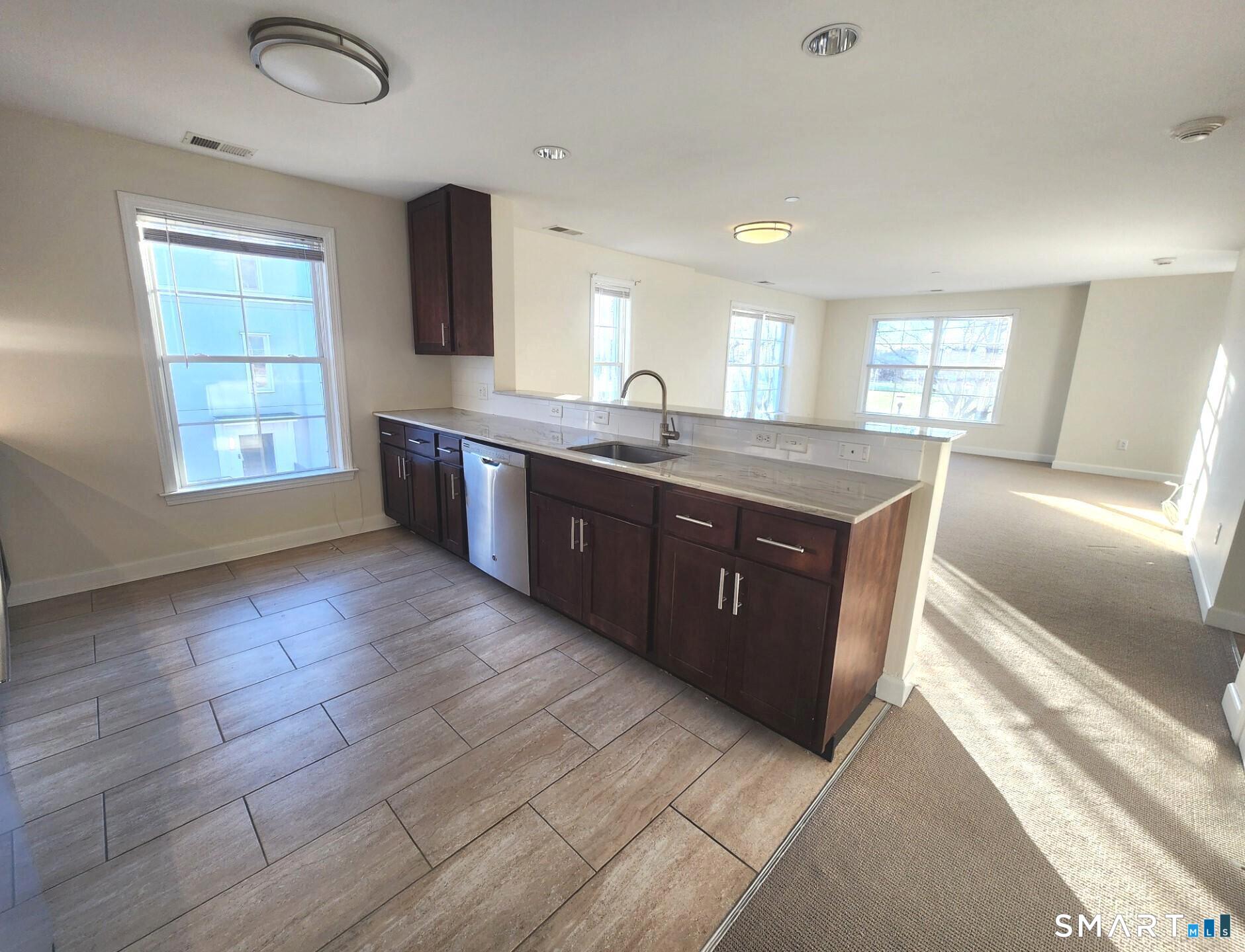 80 Merrell Avenue, Unit 80 Stamford, CT 06902 - Photo 3 of 14 Bright, Sunny + Open