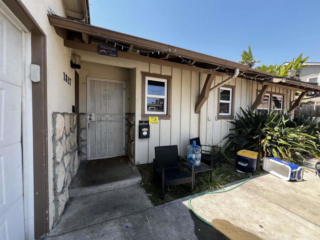 1817 Ramon Street Lemon Grove, CA 91945 - Photo 1 of 1 a view of a house with backyard and sitting area