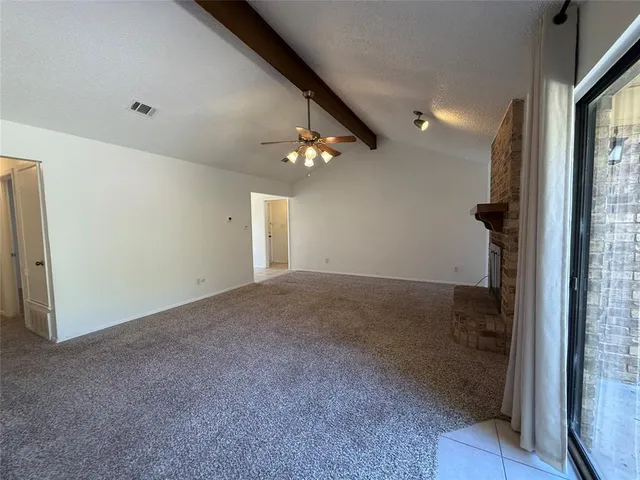 a view of a hallway to a bedroom
