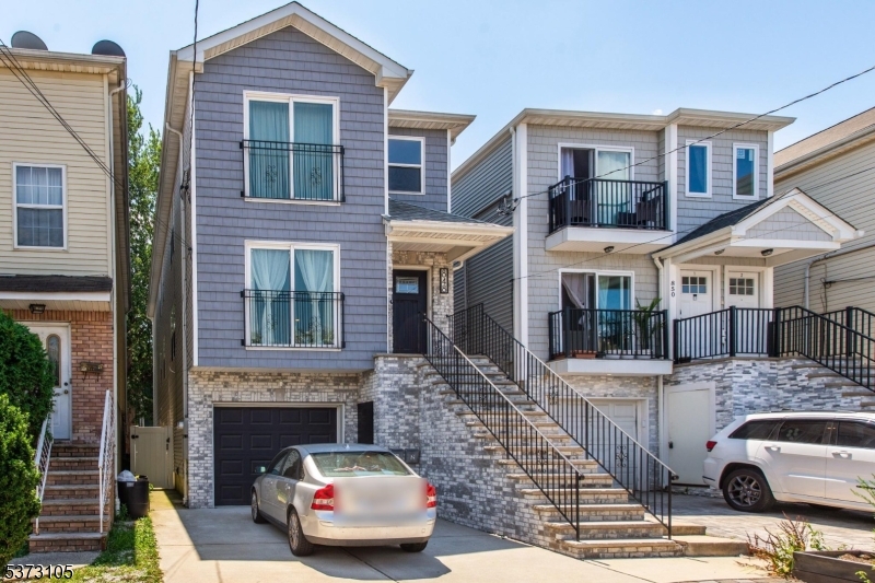 848 Lafayette Street Elizabeth, NJ 07201 - Photo 1 of 21 a front view of a house with parking space