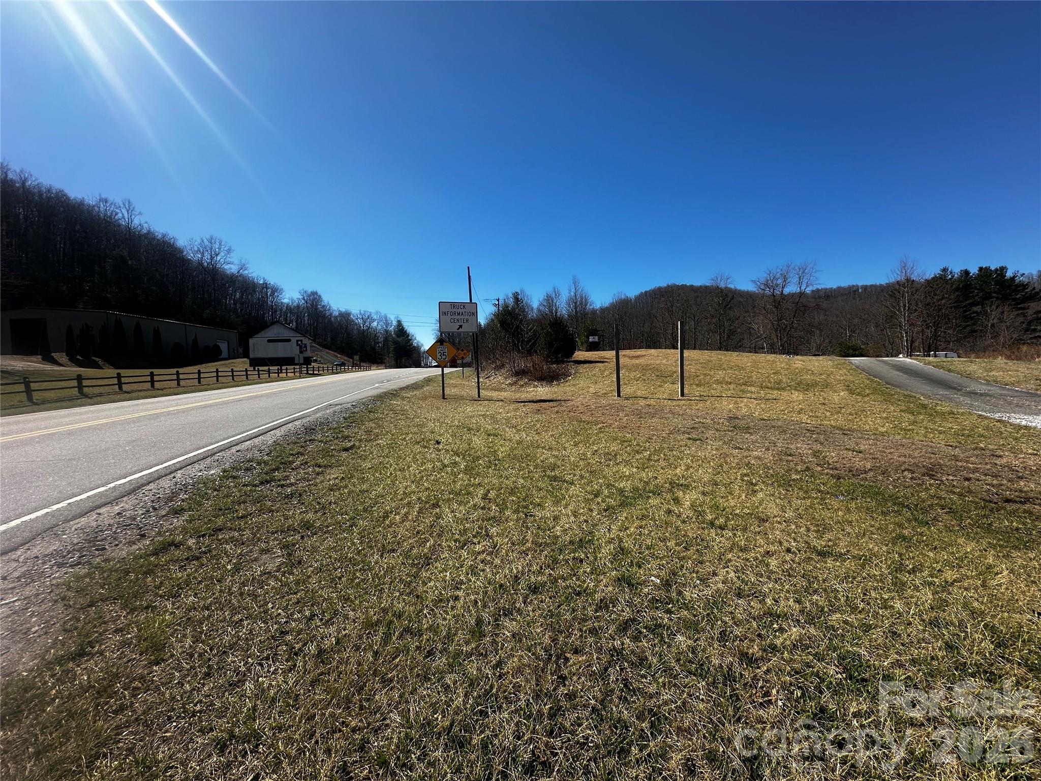 400 Old Dale Road Spruce Pine, NC 28777 - Photo 16 of 24 a view of an outdoor space and a yard