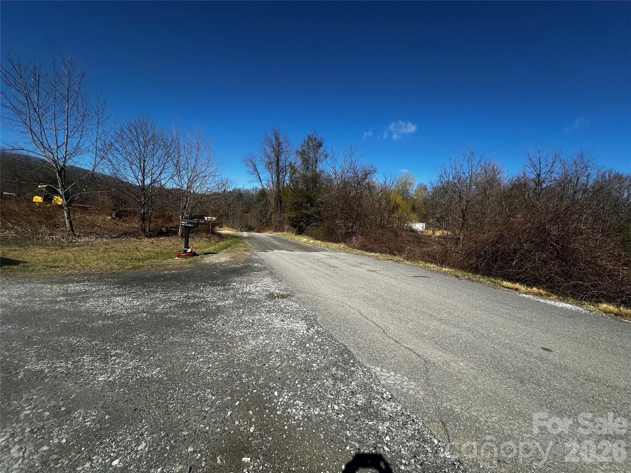 400 Old Dale Road Spruce Pine, NC 28777 - Photo 21 of 24 a view of a field with trees in the background